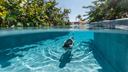 Las impresionantes piscinas de Palmaïa – The House of AïA constituyen solo uno de los relajantes servicios del resort.