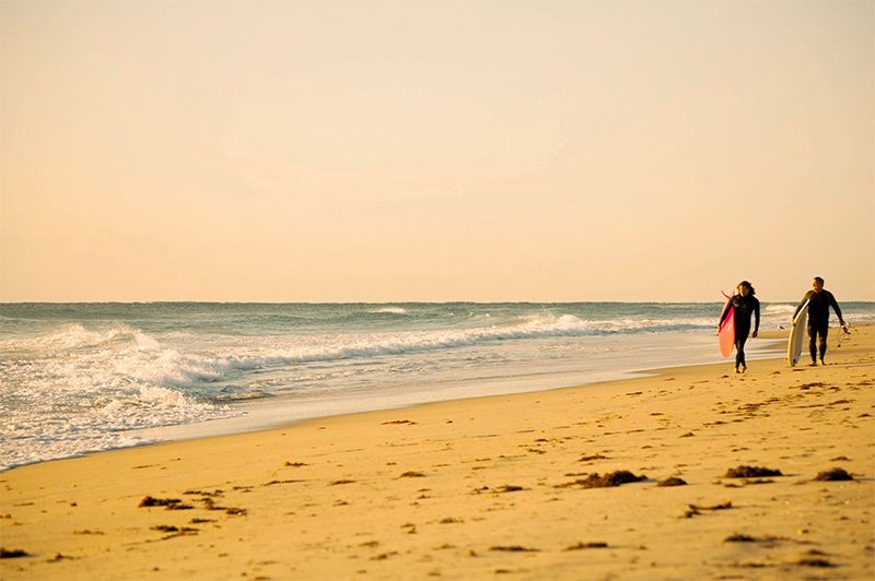 Surfistas en Delray Beach.