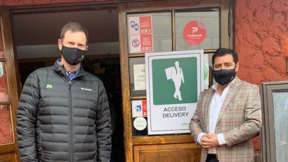 El presidente de Achiga, Máximo Picallo, junto a Felipe Bunster, gerente general de Mutual de Seguridad.