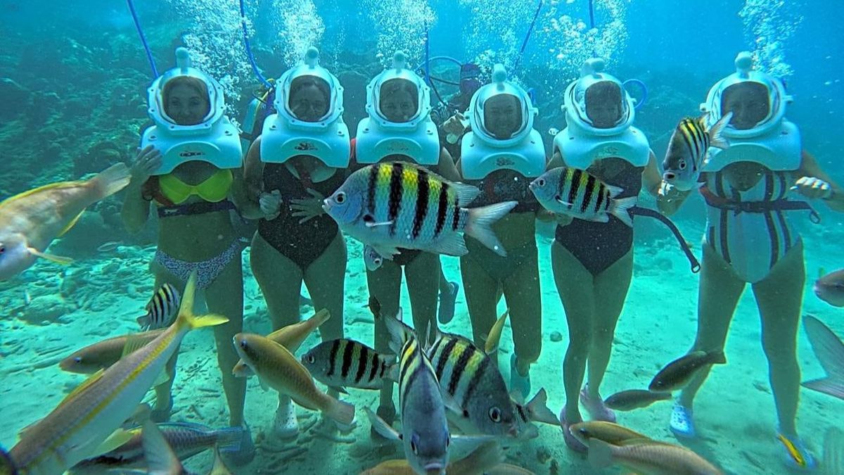 El grupo realizó una fabulosa caminata con escafandra por las cristalinas aguas de Curazao. 