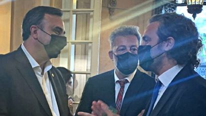 Gustavo Hani, presidente de la Cámara Argentina de Turismo, junto a Santiago Cafiero en la presentación del plan.