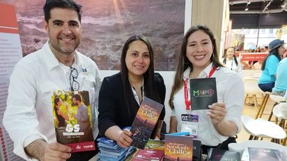 Juan Pablo Casorzo junto al equipo de la Corporación Regional Santiago presente en FIT.&nbsp;