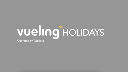 Logo de Vueling Holidays la plataforma de viajes combinados de Vueling en alianza con Ávoris.