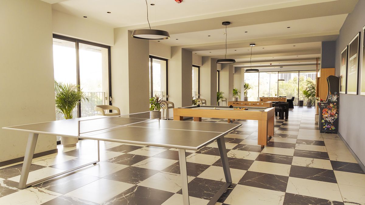 Salón de juegos en el Edificio Iqon en Quito, que tiene departamentos gestionados por Top Rentals. Salón de juegos en el Edificio Iqon en Quito, que tiene departamentos gestionados por Top Rentals.