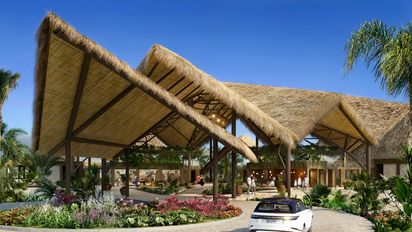 Lobby de Dreams Flora Resort & Spa de Inclusive Collection.