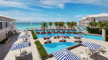 Representación de la piscina rediseñada de Sandals Montego Bay, con acceso directo a la playa. Se aprecia además las nuevas suites swim-up con ingreso desde la piscina.