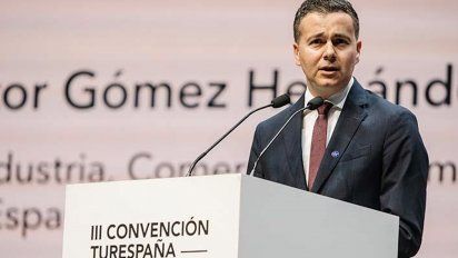 El ministro de Industria, Comercio y Turismo, Héctor Gomez, durante su presentación en la Convención Turespaña.