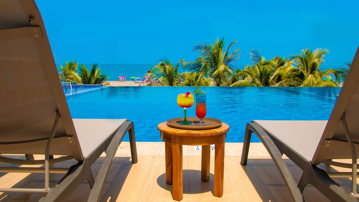 Radisson Cartagena Ocean Pavilion ofrece piscina, spa, jacuzzi y acceso directo a la playa. Radisson Cartagena Ocean Pavilion ofrece piscina, spa, jacuzzi y acceso directo a la playa.