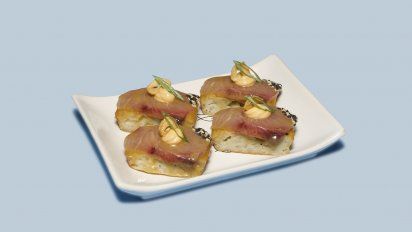 Mejor tapa de Buenos Aires: Torreja NiguiriTorreja de cebada, pesca marinada, mojo picón, ajo frito, negui y sésamo.