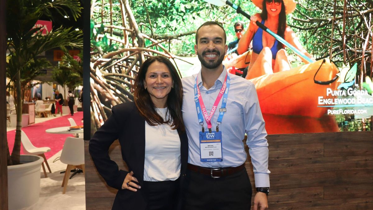 Mariana Pereira Barnes, Global Marketing & Trade Account Executive, y Bryan Mantilla, gerente comercio para Colombia de Visit Florida.