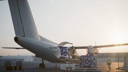 Render de la carga de cápsulas de hidrógeno de Universal Hydrogen en un turbohélice como alguno de los que utiliza American Airlines.